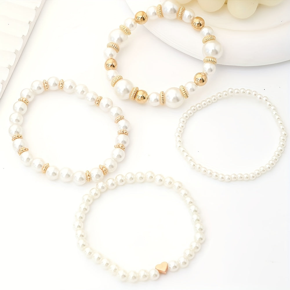 Conjunto de elegantes pulseras en forma de corazón con perlas