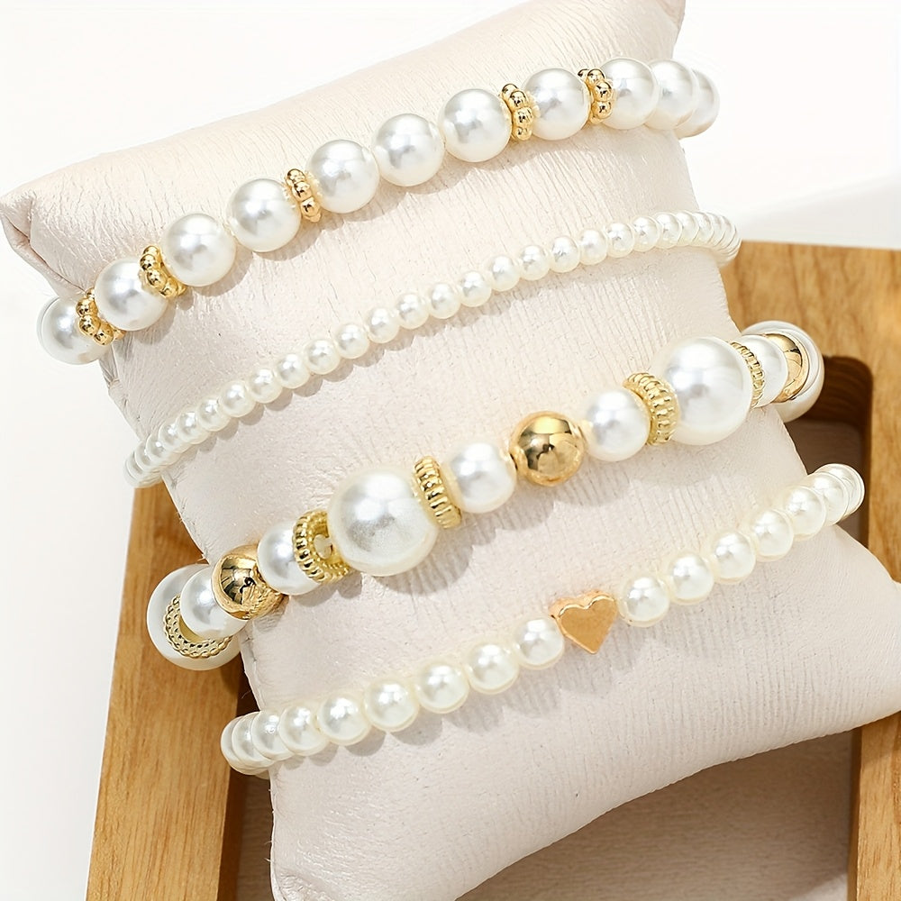 Conjunto de elegantes pulseras en forma de corazón con perlas