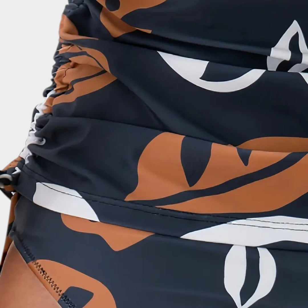 Eustaquia™ | Bañador entero tropical con detalle de cordón